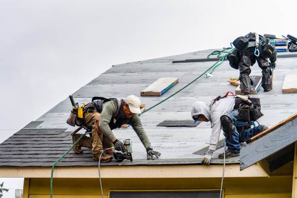 Professional Roof Replacement technician working in Montvale, NJ